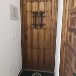 Entre Patios Y Flores