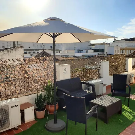 Entre Patios Y Flores